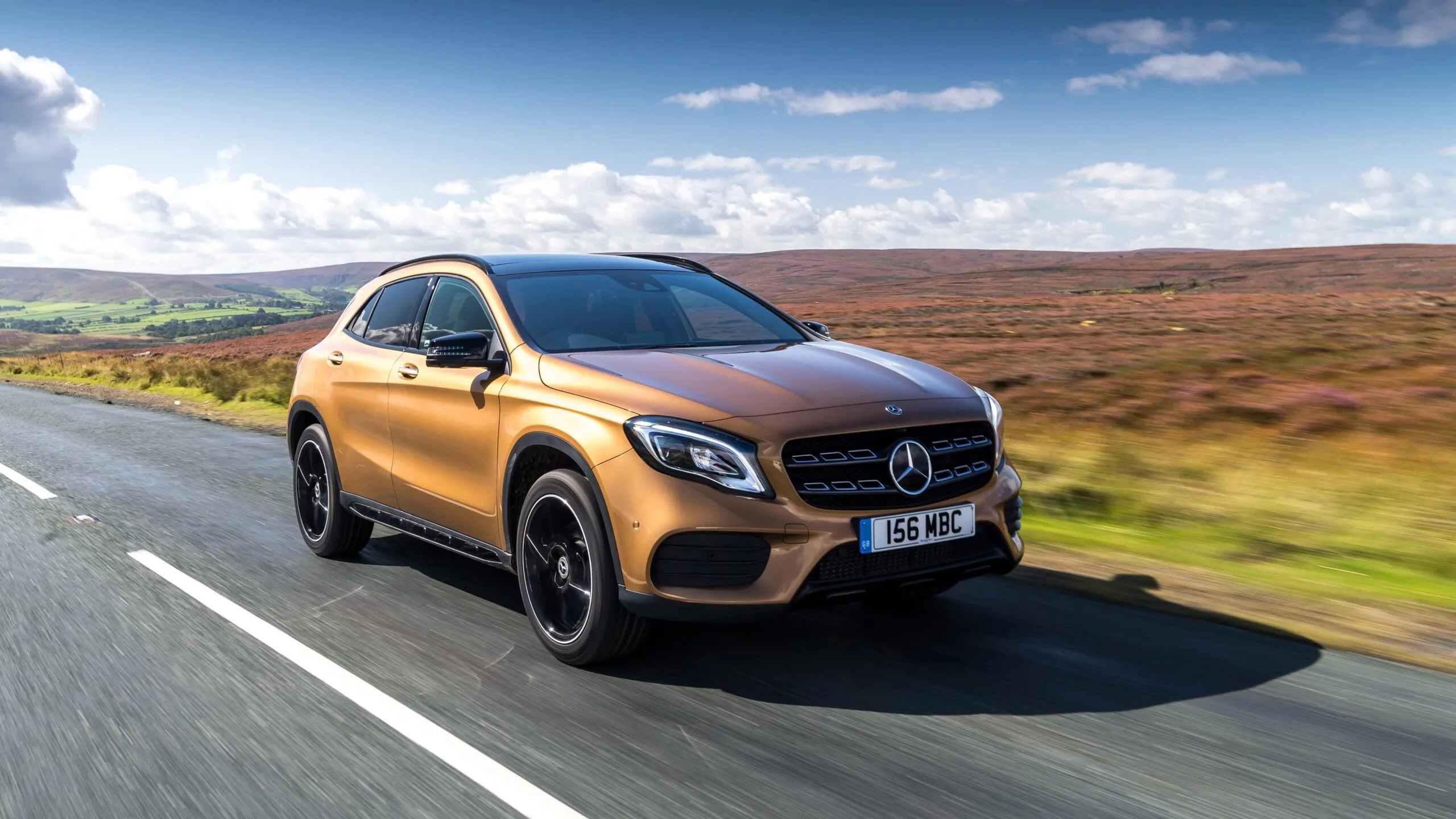 Mercedes SUV Driving Fast on Open Country Road HD Wallpaper