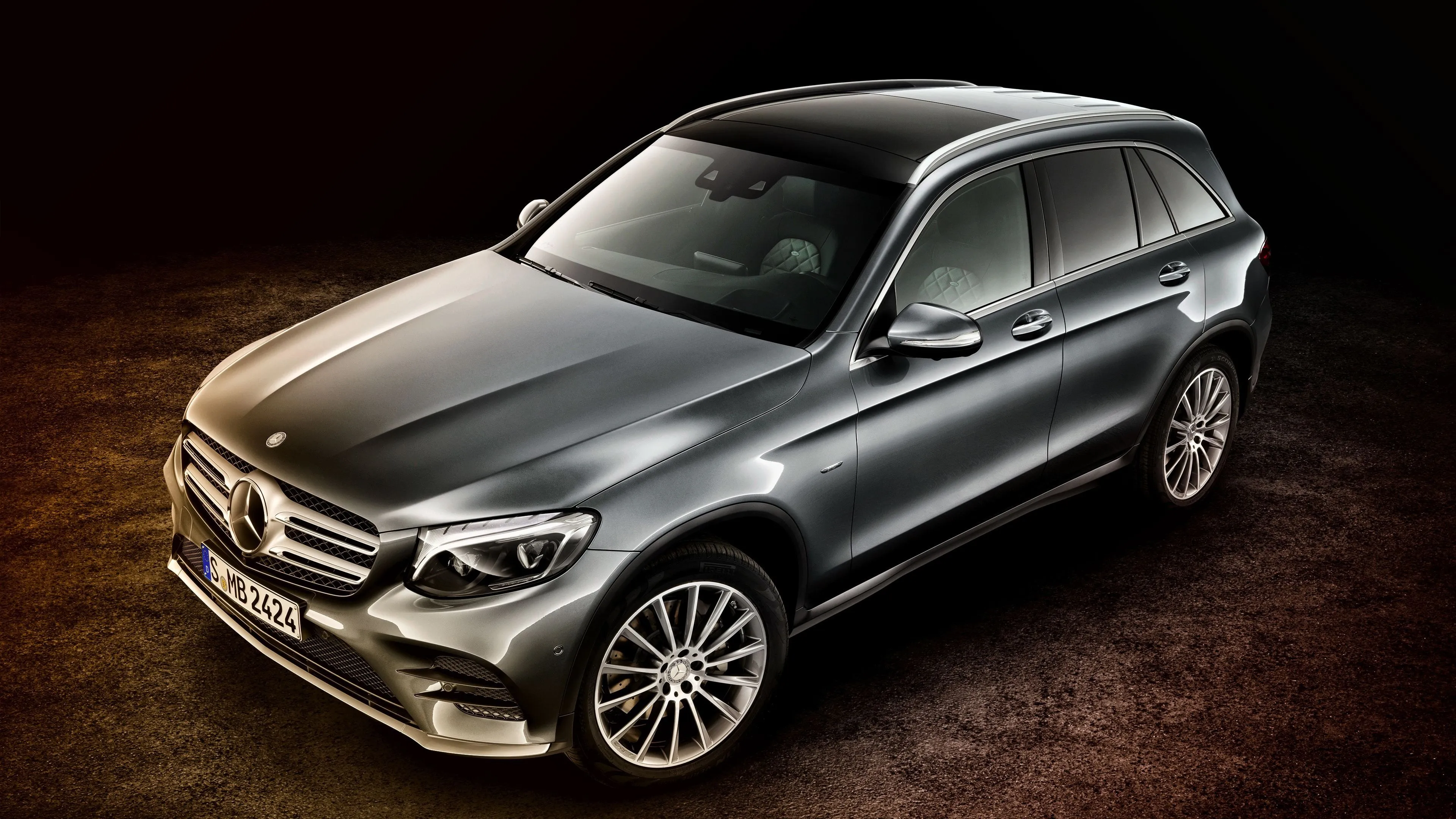Mercedes SUV Highlighted Against a Dark Studio Backdrop