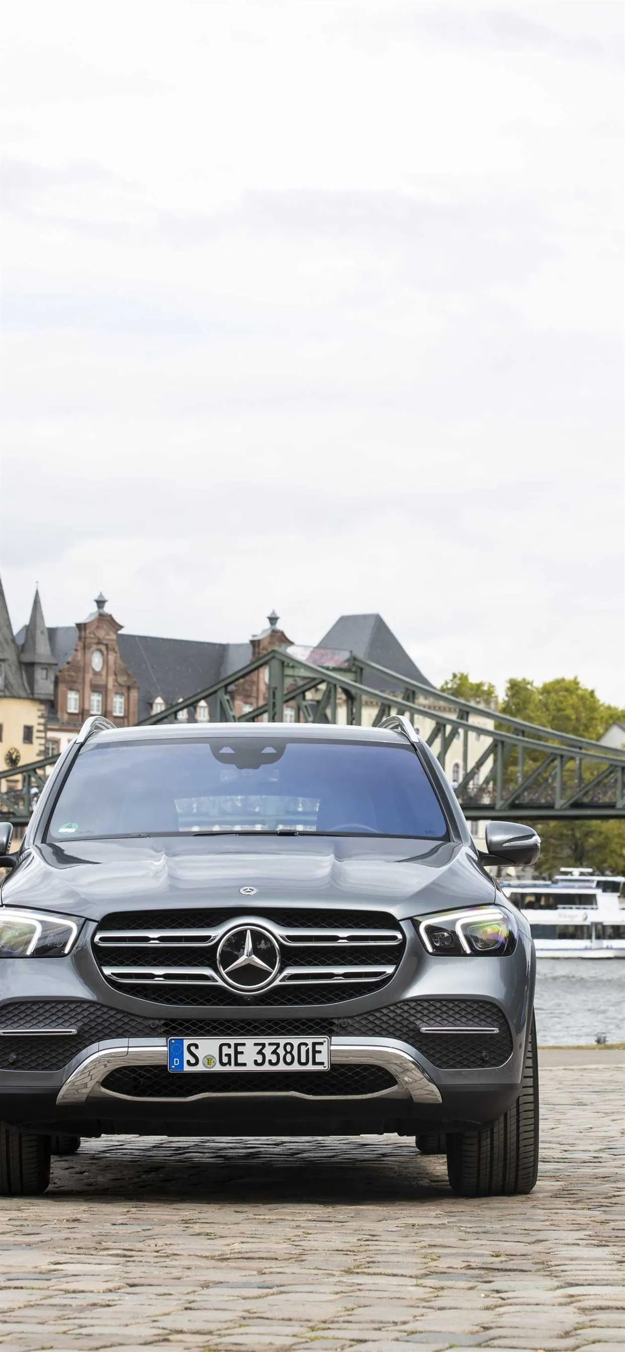 Mercedes SUV Parked On A Historic Cobblestone Road