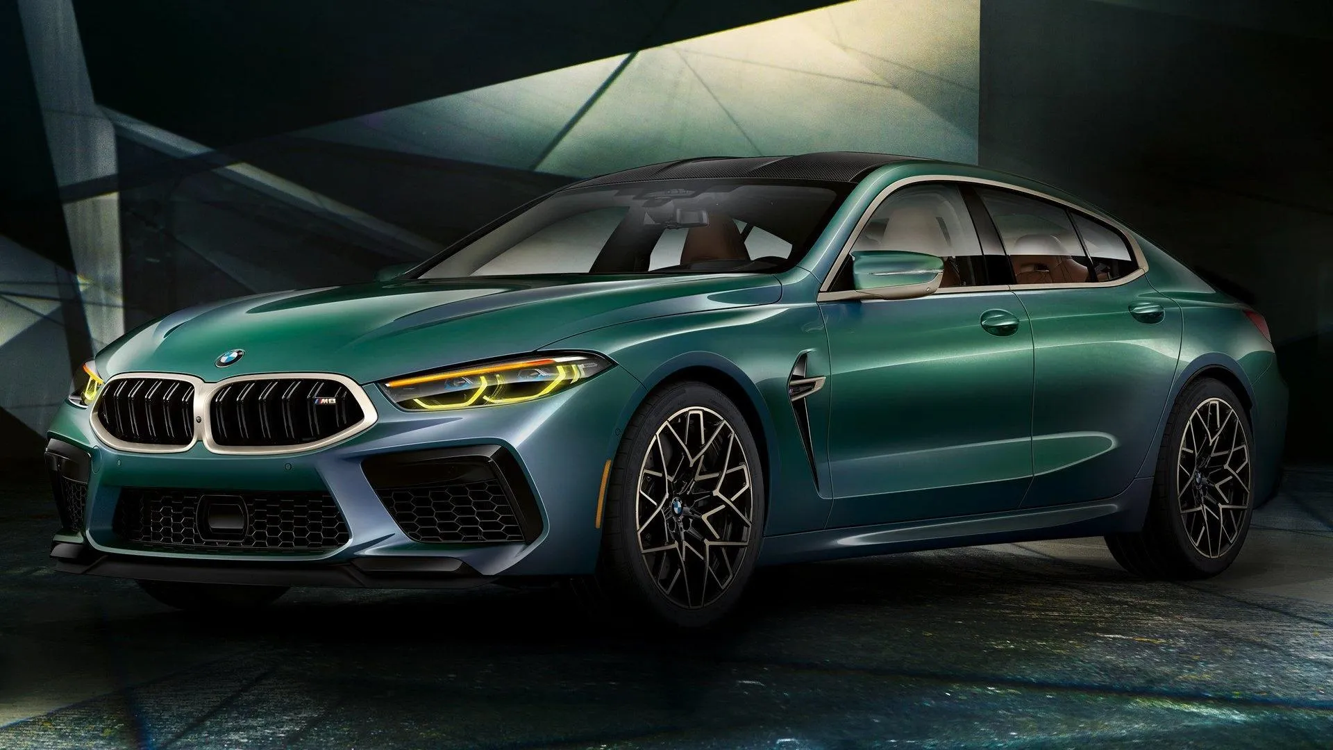 Metallic Green Bmw M8 Coupe Shown in Luxury Showroom
