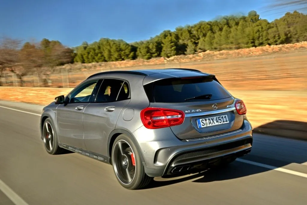 Modern Silver Mercedes Driving on Open Country Road