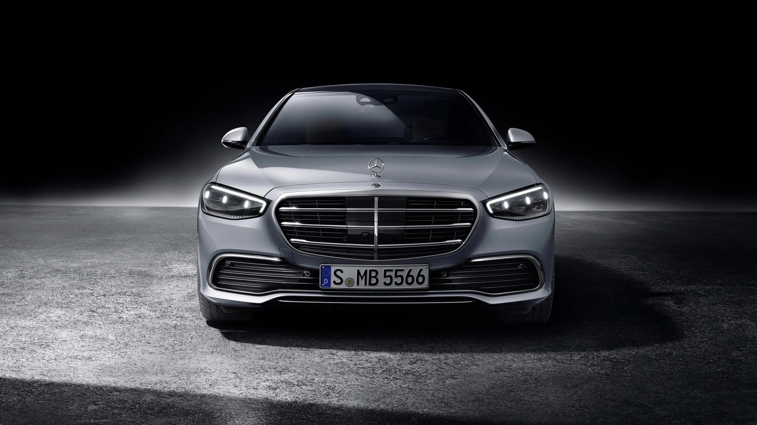 New Mercedes Benz Sedan in Dark Luxury Studio Setting