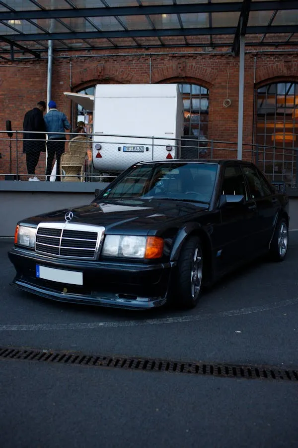 Old Mercedes Benz Sedan Near Industrial Loading Dock