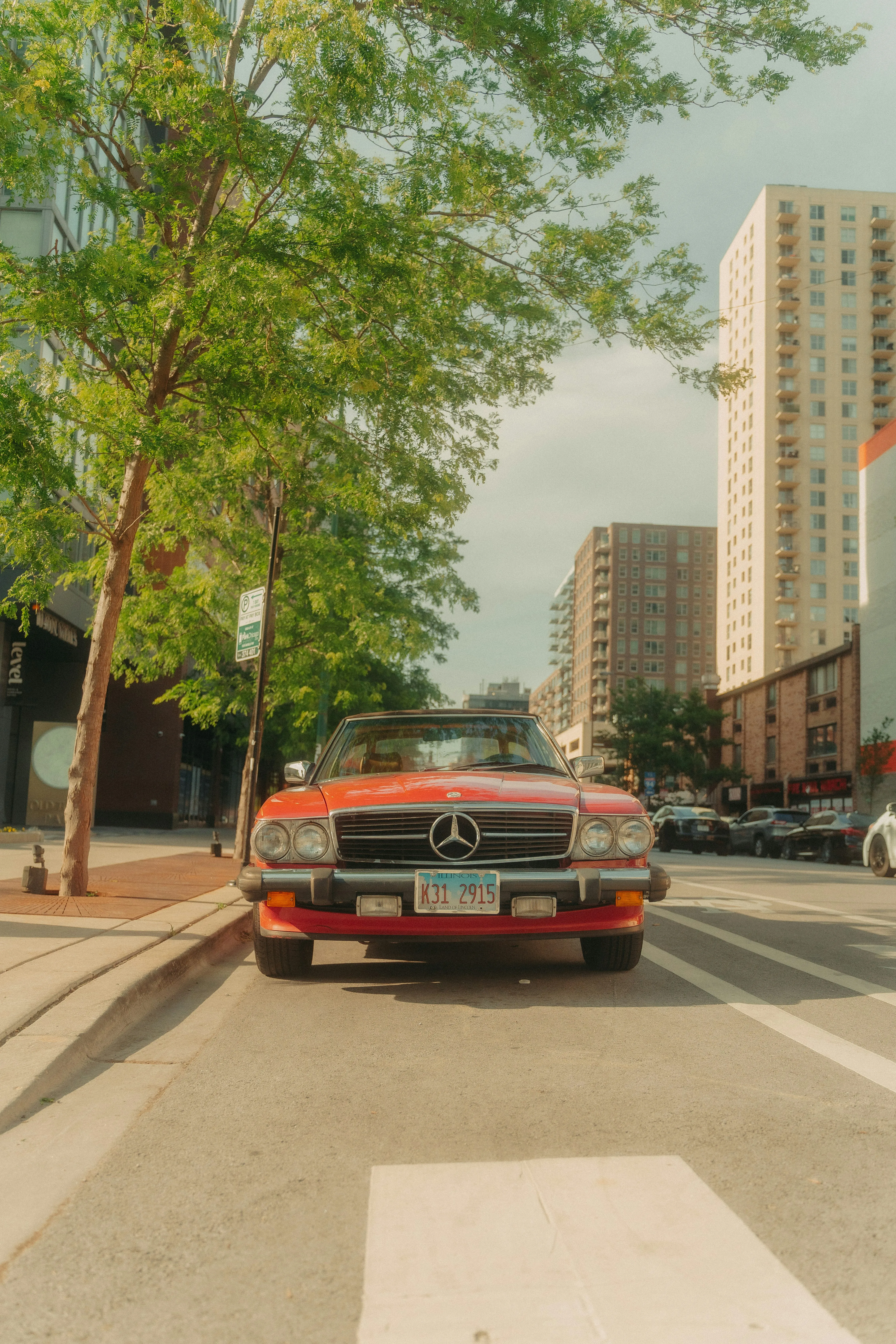 Orange Vintage Mercedes Benz Parked on City Street image