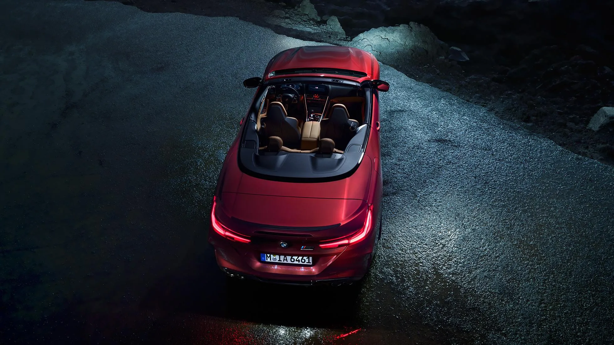 Overhead View of Red Bmw Convertible on Dark Wet Pavement