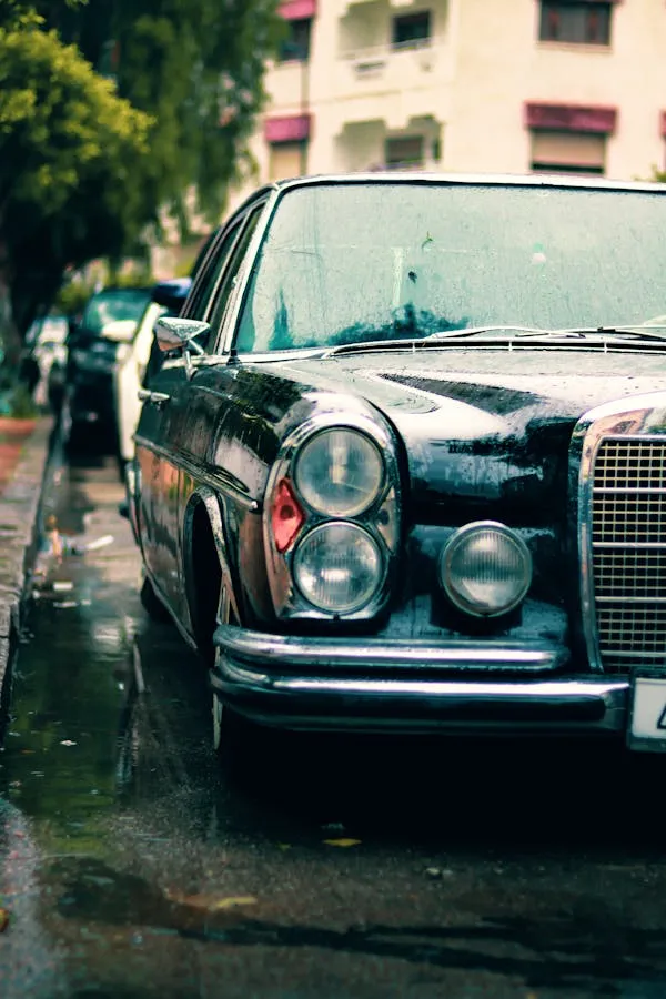 Rain Soaked Classic Mercedes Benz in Urban Surrounding