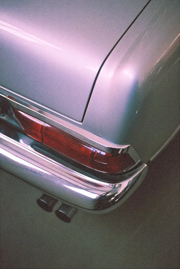 Rear Close Up of Vintage Mercedes Benz in Purple Wallpaper