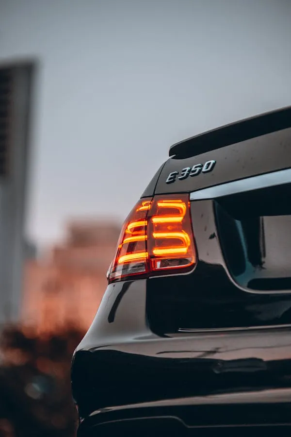 Rear Closeup of Mercedes Benz E350 with Tail Lights On