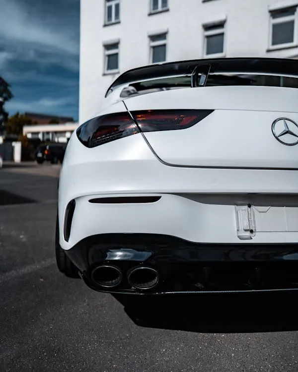 Rear Design of White Mercedes Coupe in Urban Street HD