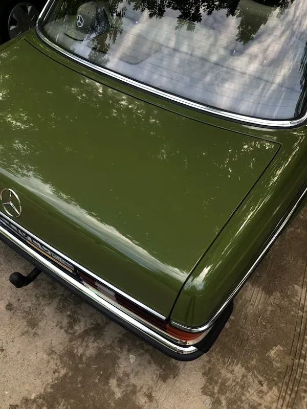Rear Section of Green Classic Mercedes Benz Car image