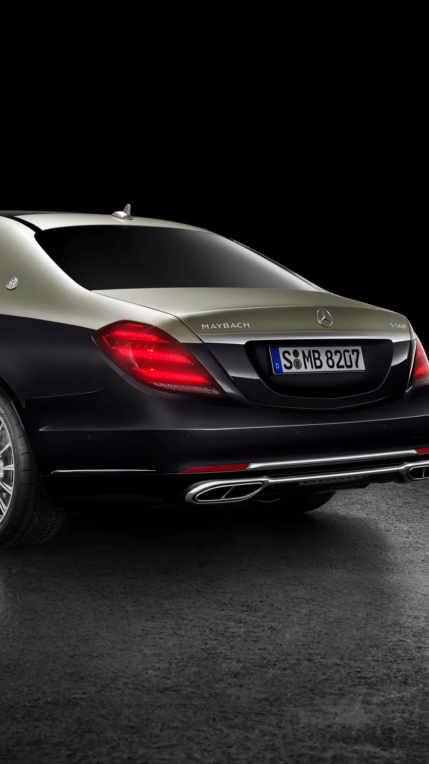 Rear Side of Black Mercedes Maybach on Open Asphalt 4K