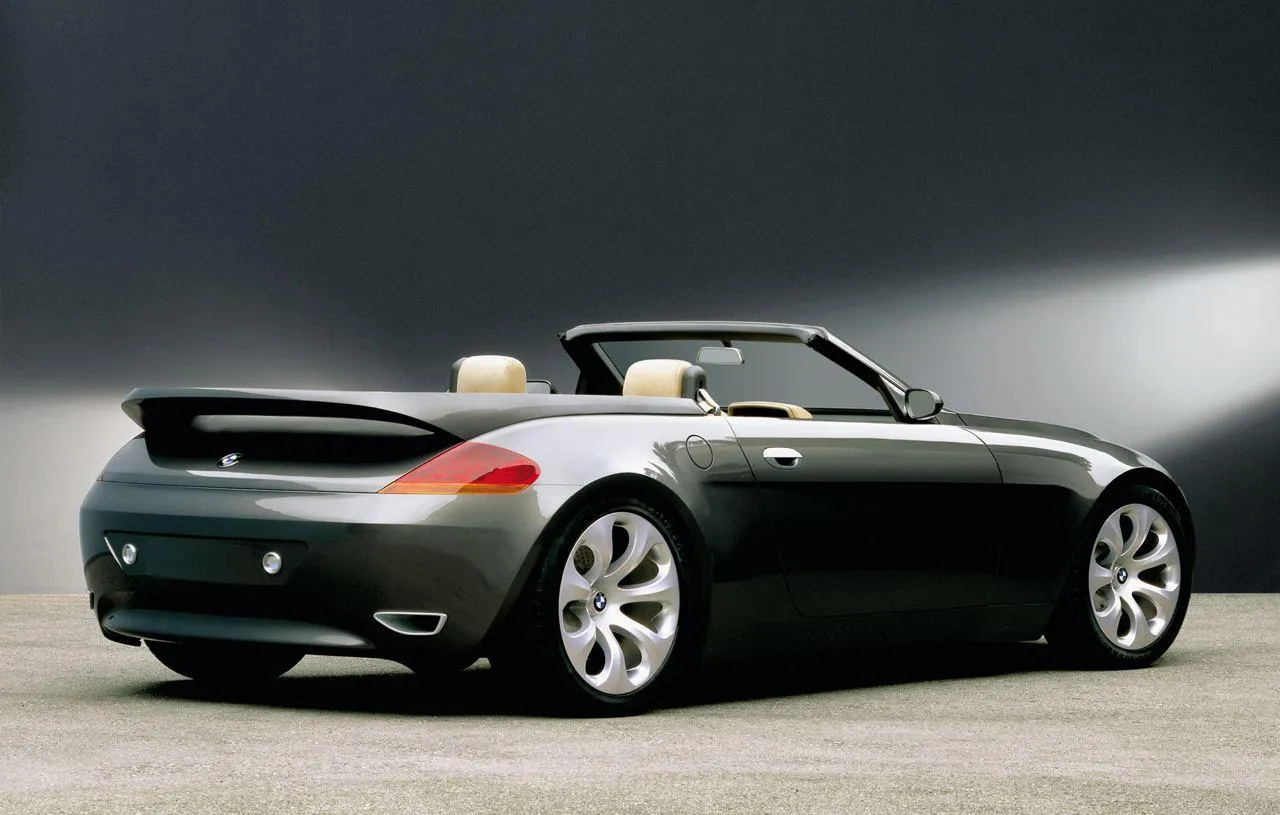 Rear View of a Black Bmw Convertible in Studio Lighting