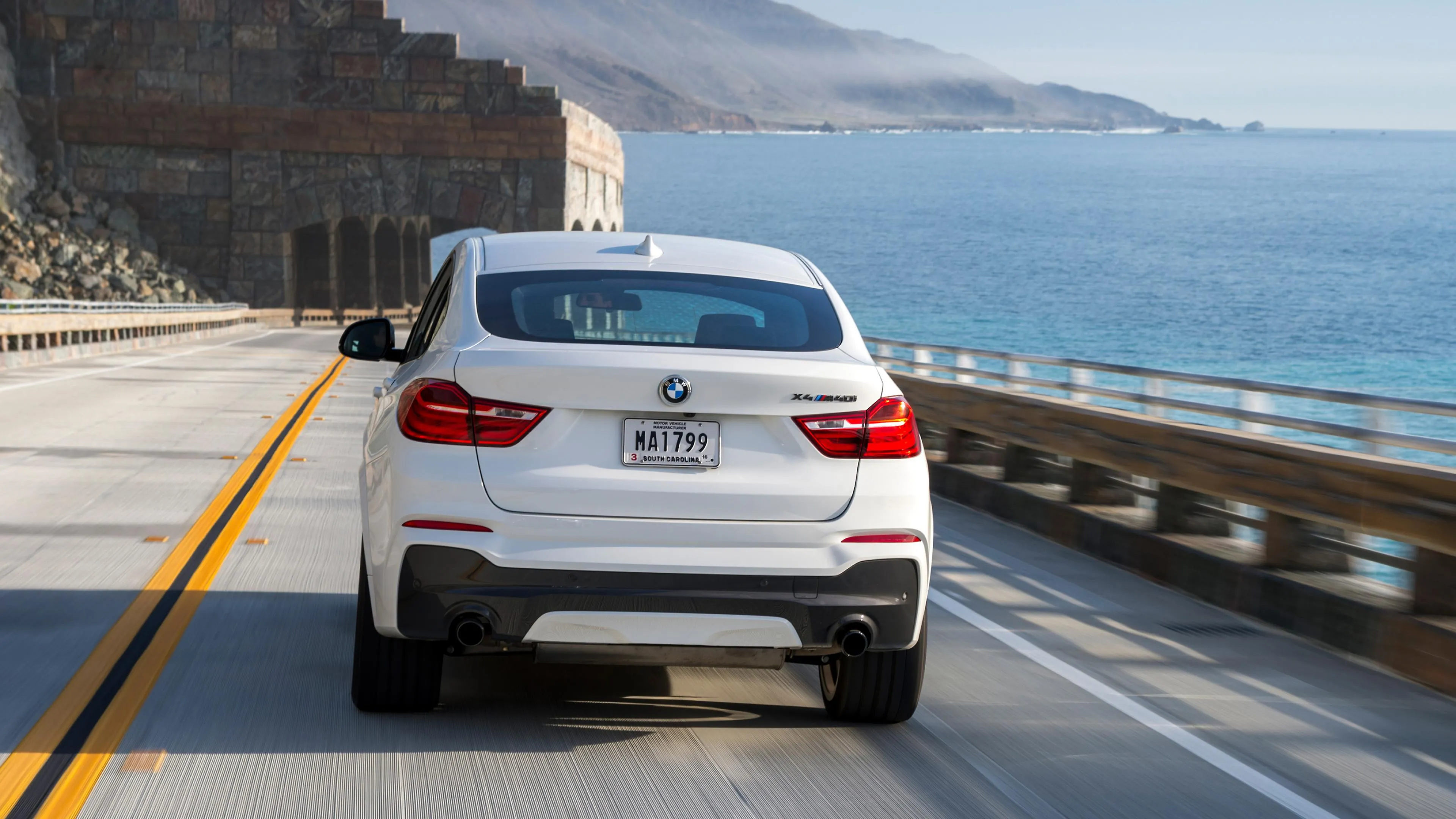 Rear View of Bmw Driving on Coastal Highway Hd Wallpaper