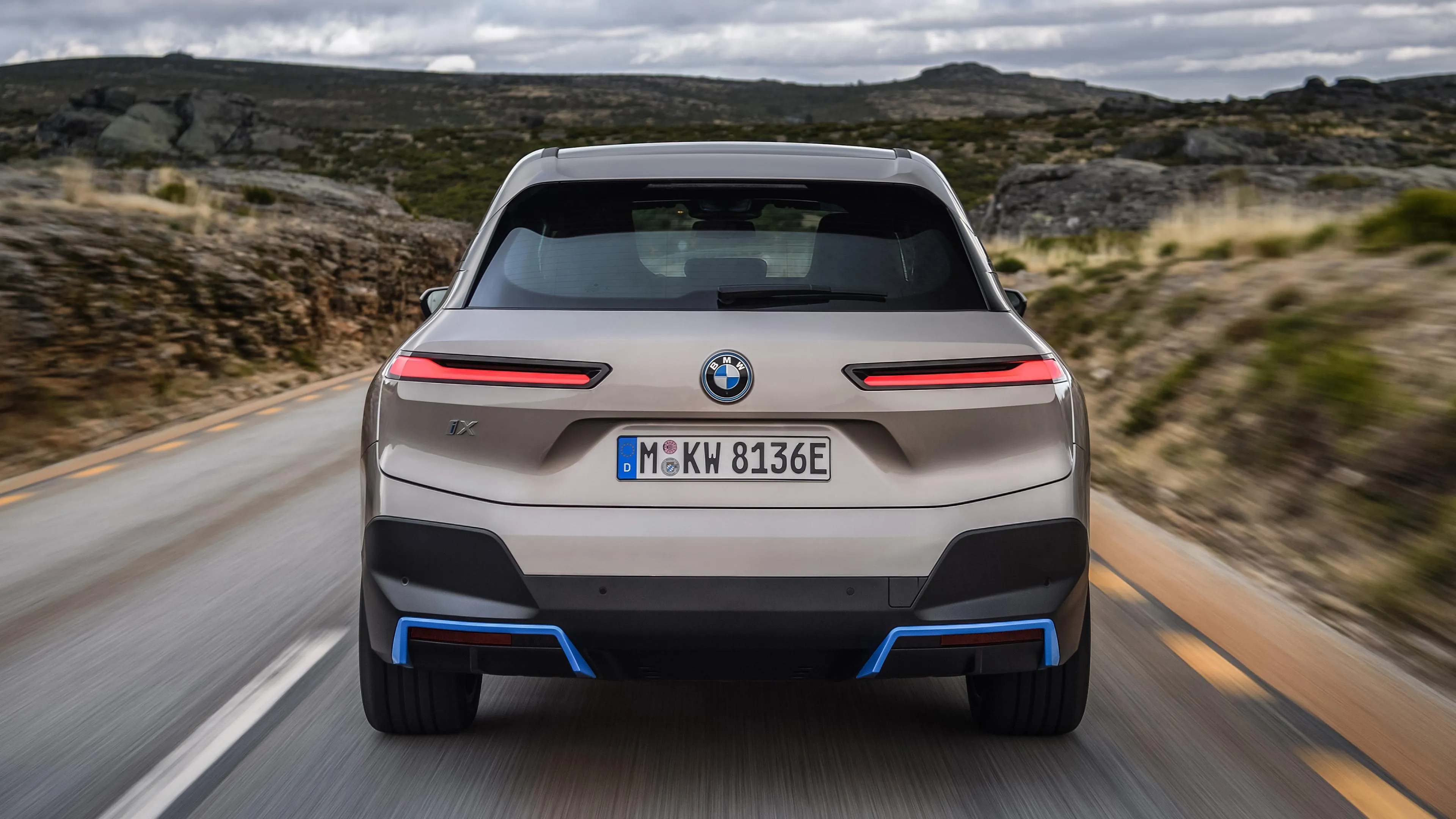 Rear View of Bmw Electric Car on a Mountain Road Image