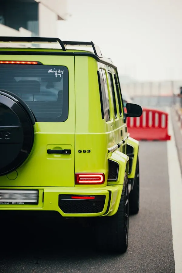 Rear View of Bright Green Mercedes Benz G Wagon Wallpaper