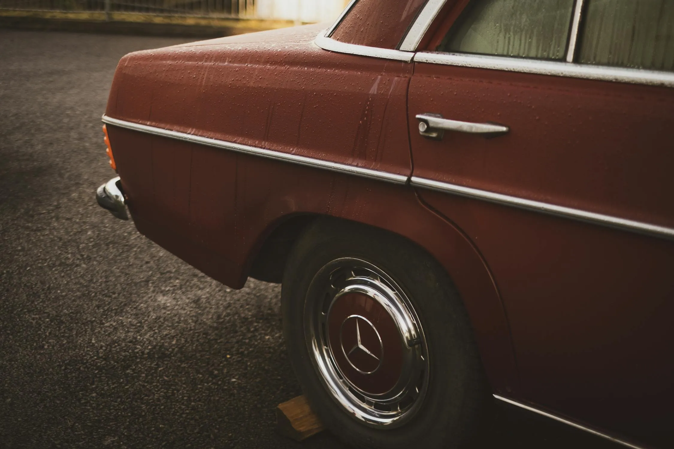 Rear View of Brown Mercedes Benz Car with Old Style Wheels