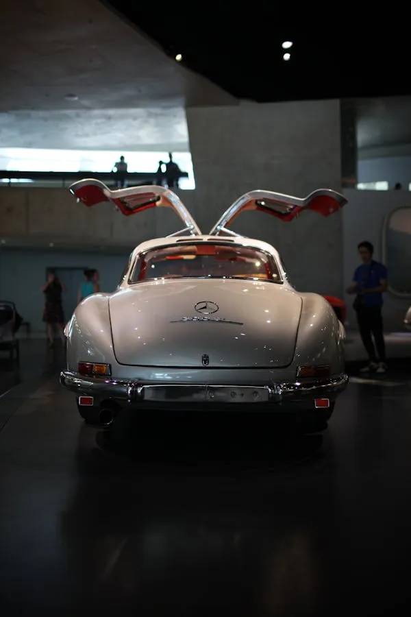 Rear View of Classic Silver Mercedes Benz in Showroom image