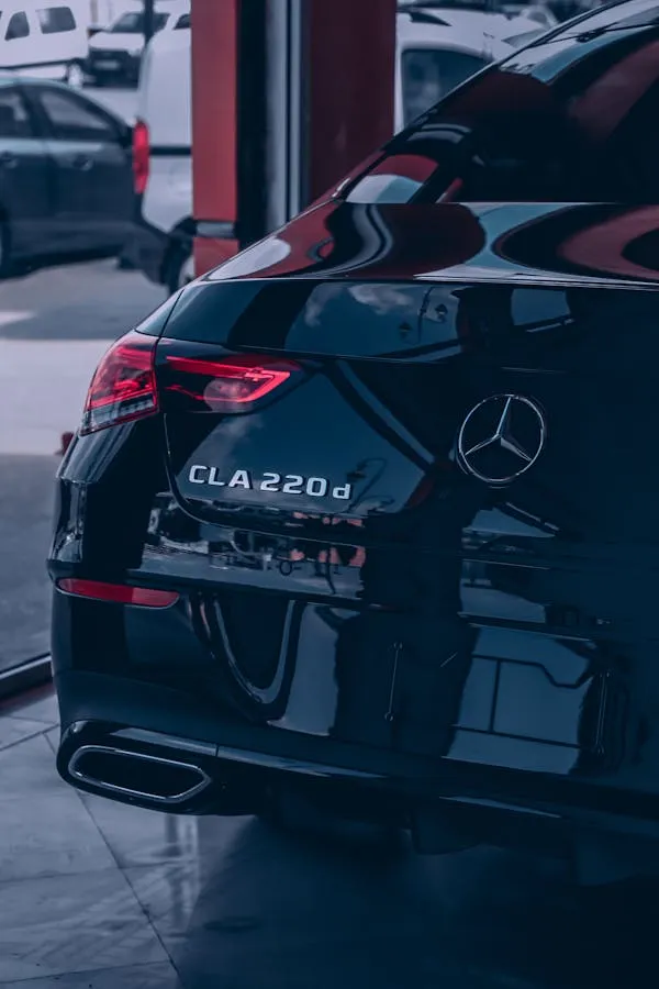 Rear View of Mercedes CLA220 at Night with Lights On