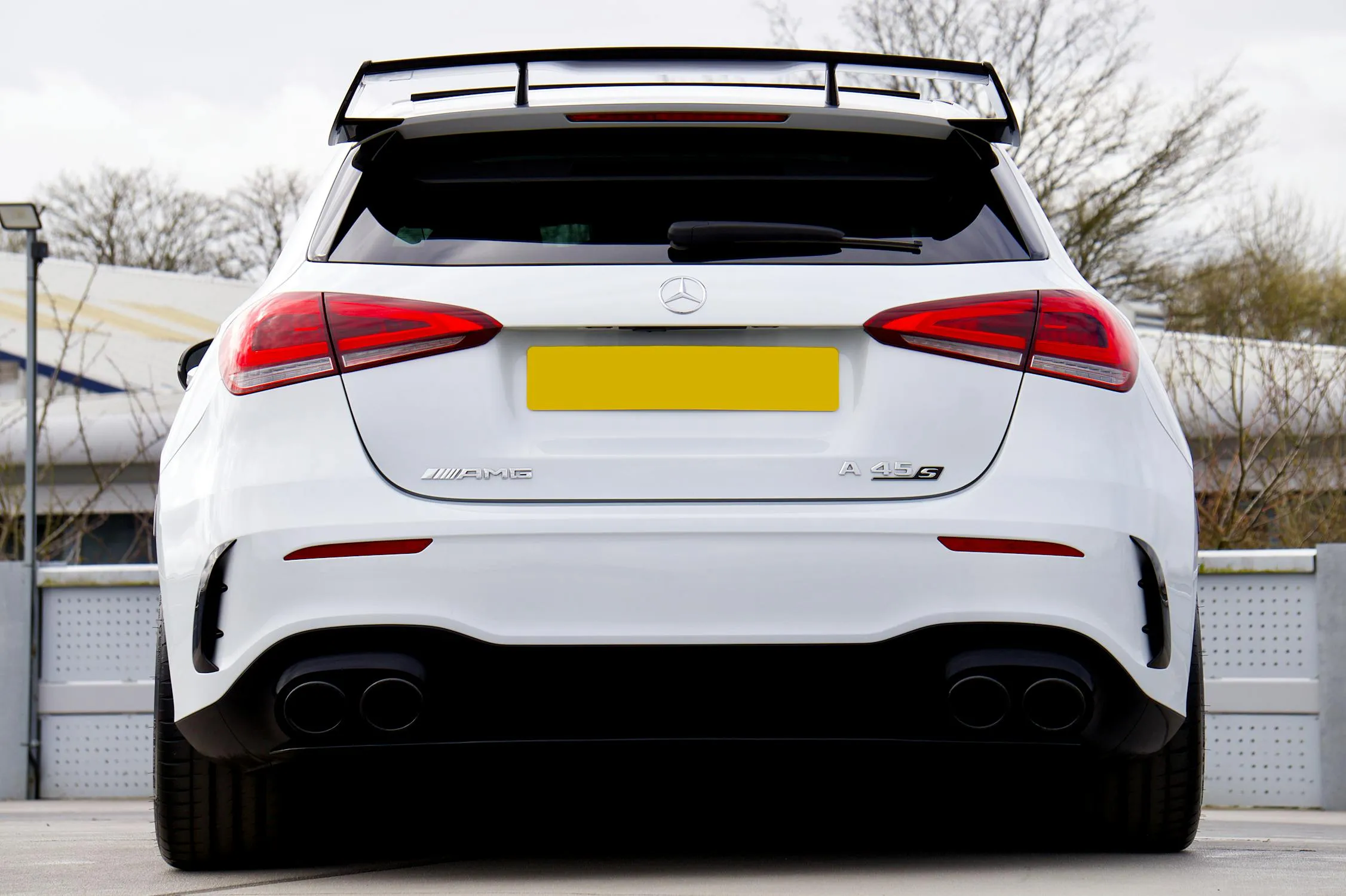 Rear View of Modern Mercedes Benz AMG on Street Wallpaper