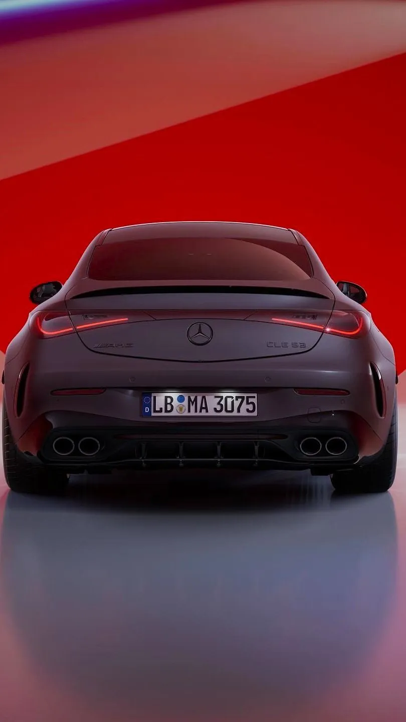 Rear View of Modern Mercedes Benz Car on Red Background