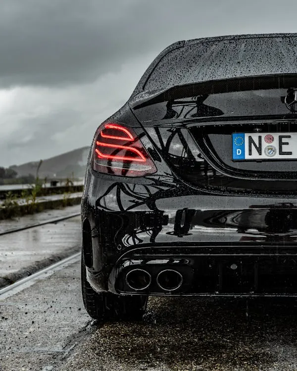 Rear View of Shiny Black Mercedes Benz Sports Sedan