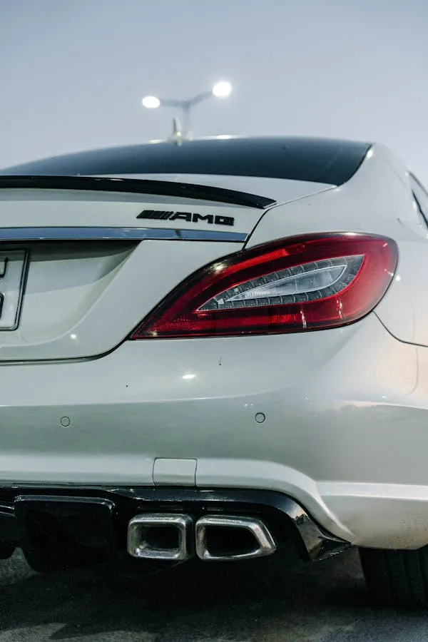 Rear View of White Mercedes AMG with Dual Exhaust image