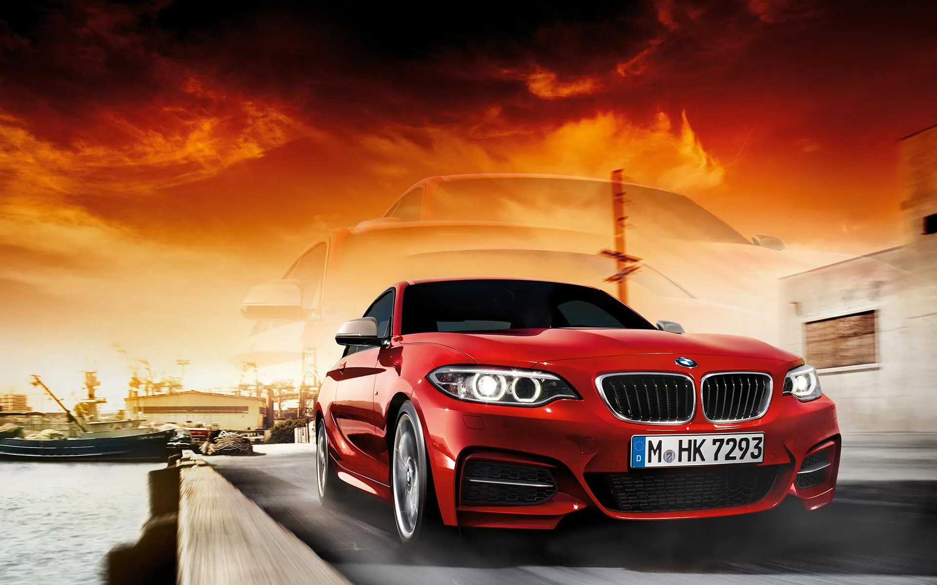 Red Bmw Car with Dramatic Sunset Background Wallpaper