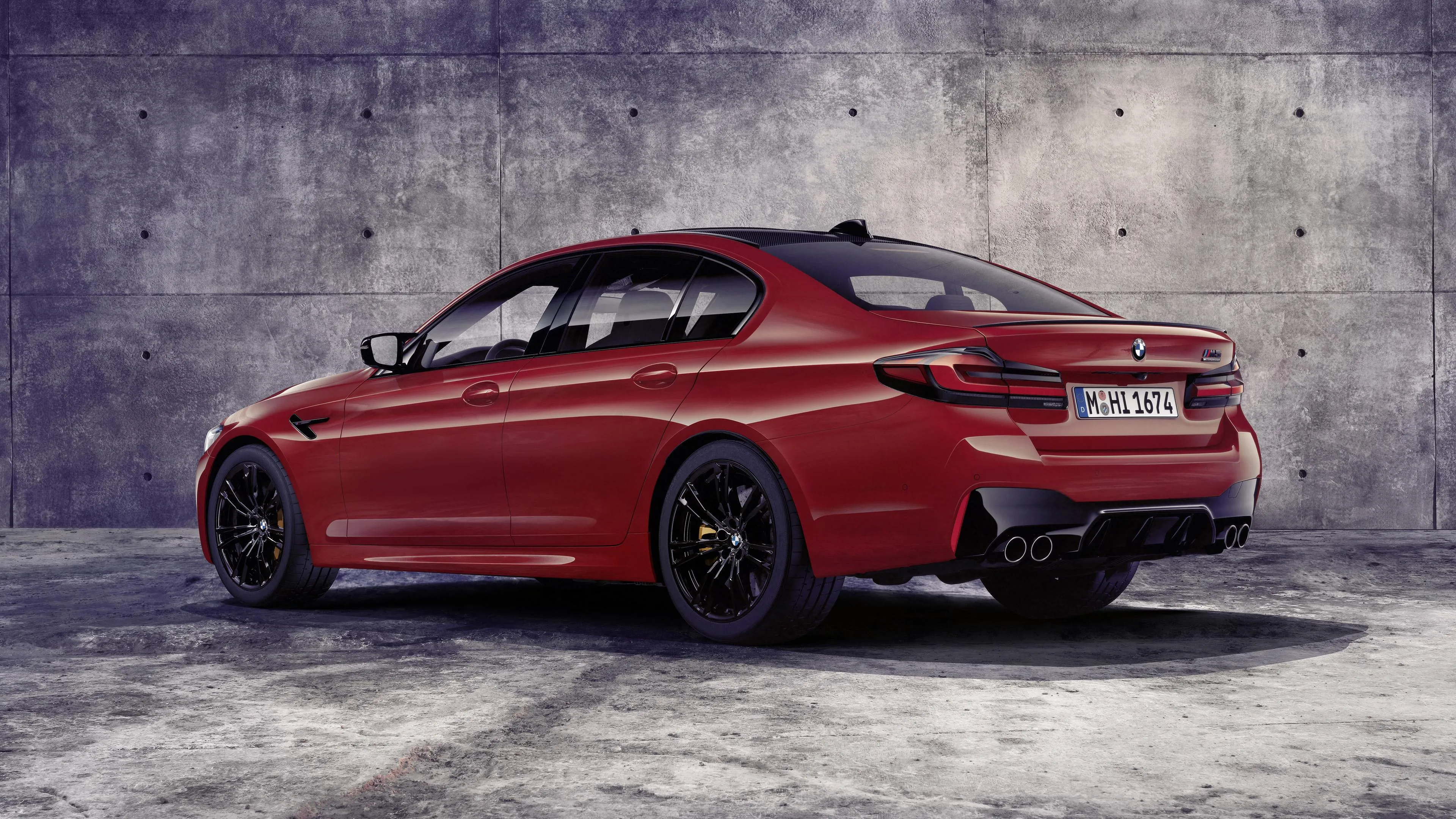 Red Bmw Coupe Parked in Studio with Dark Background