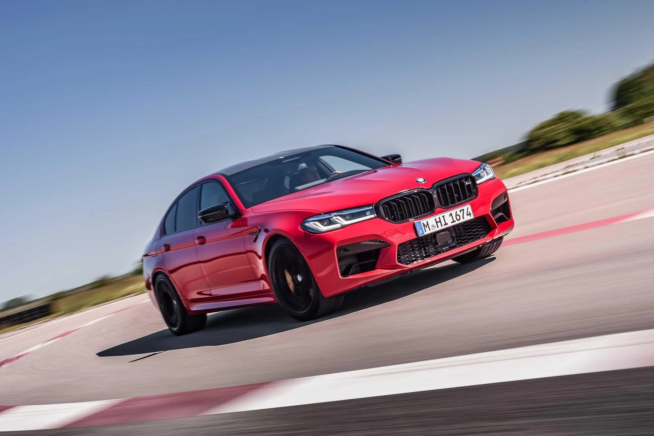 Red Bmw M4 Speeding on the Road with Dynamic Action Shot