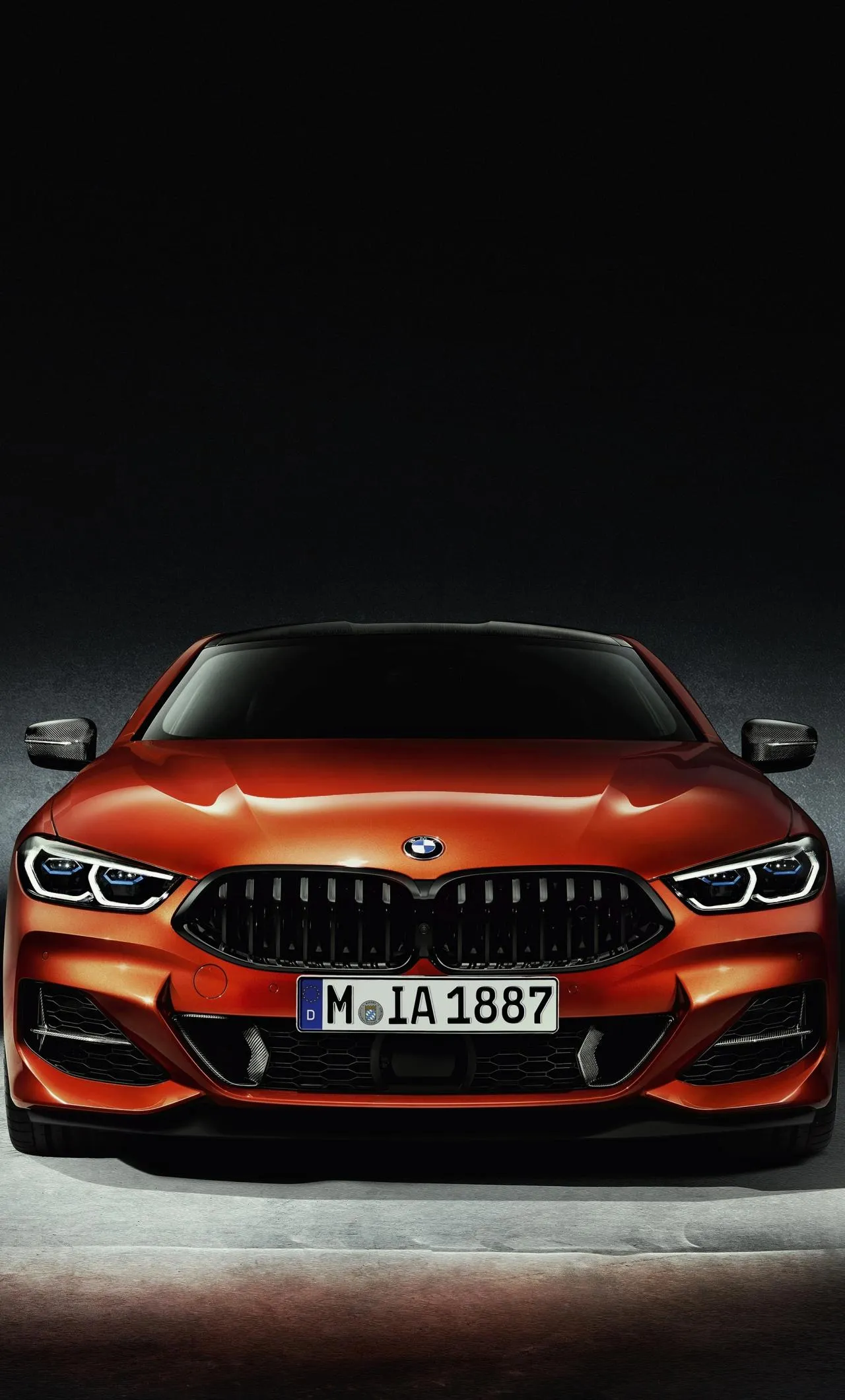 Red Bmw Sports Car in a Dynamic Outdoor Setting on the Road