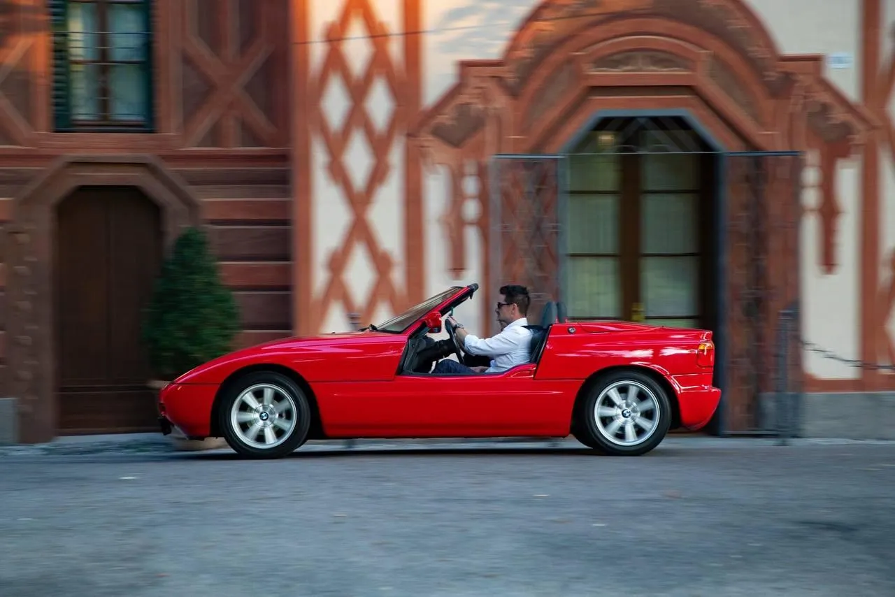 Red Bmw Z3 Convertible Parked Near Historic Building Hd