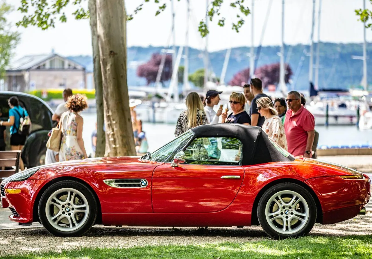 Red Classic Bmw Convertible Parked Near a Marina Wallpaper
