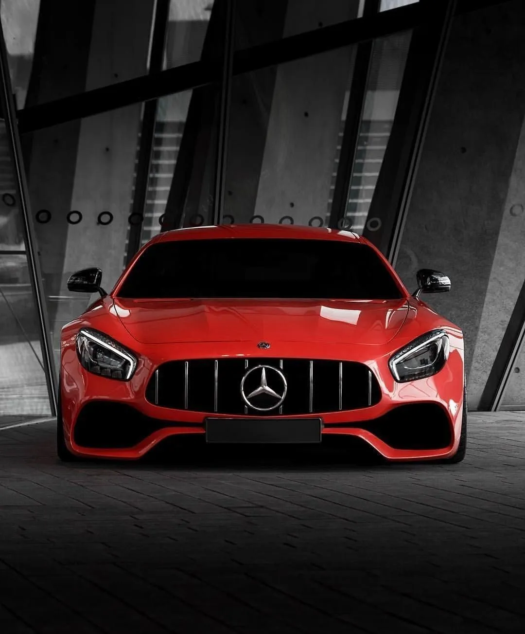 Red Mercedes AMG GT Front View in a Dramatic Setting