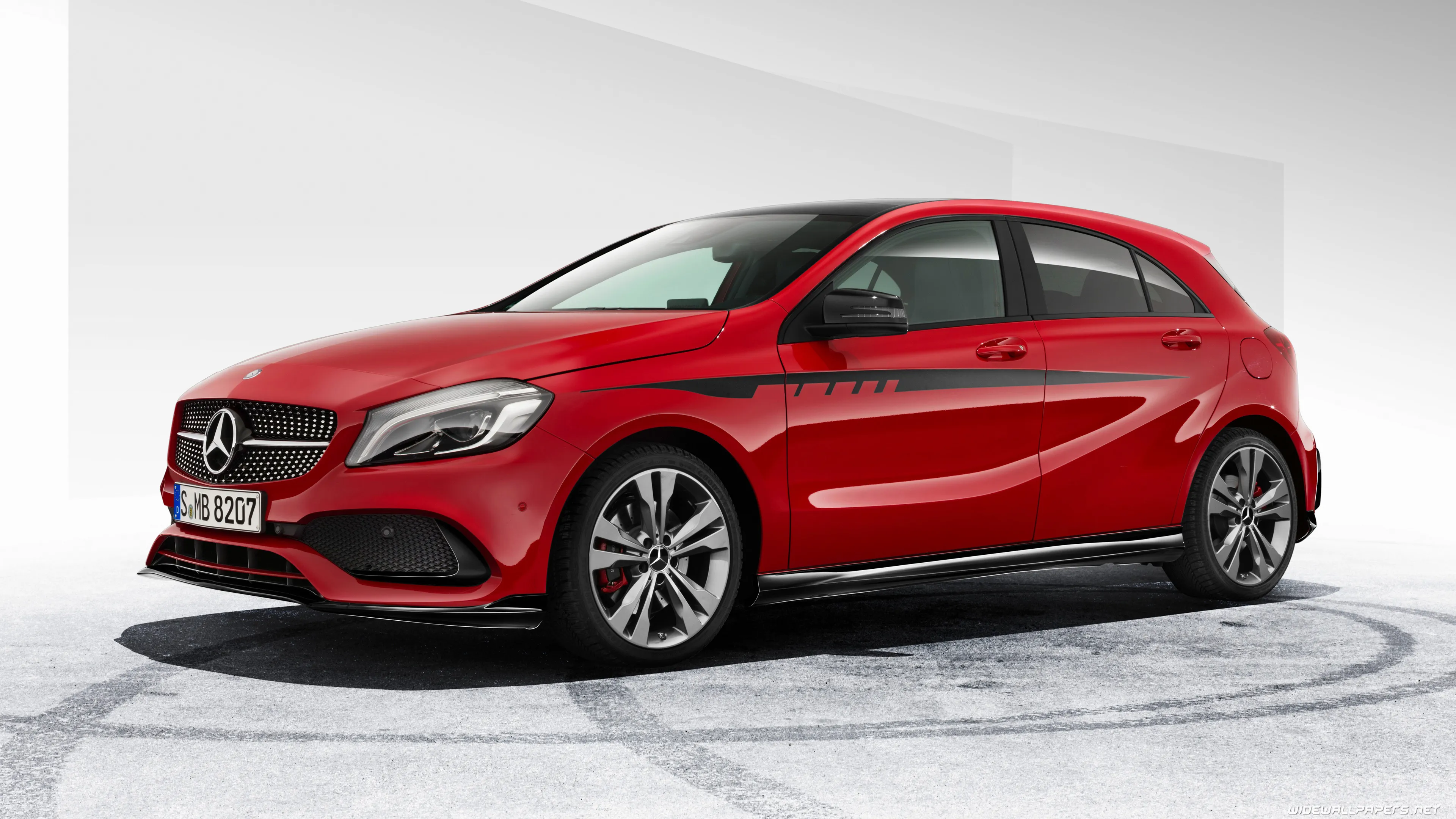 Red Mercedes Benz Compact Hatchback on White Floor Wallpaper