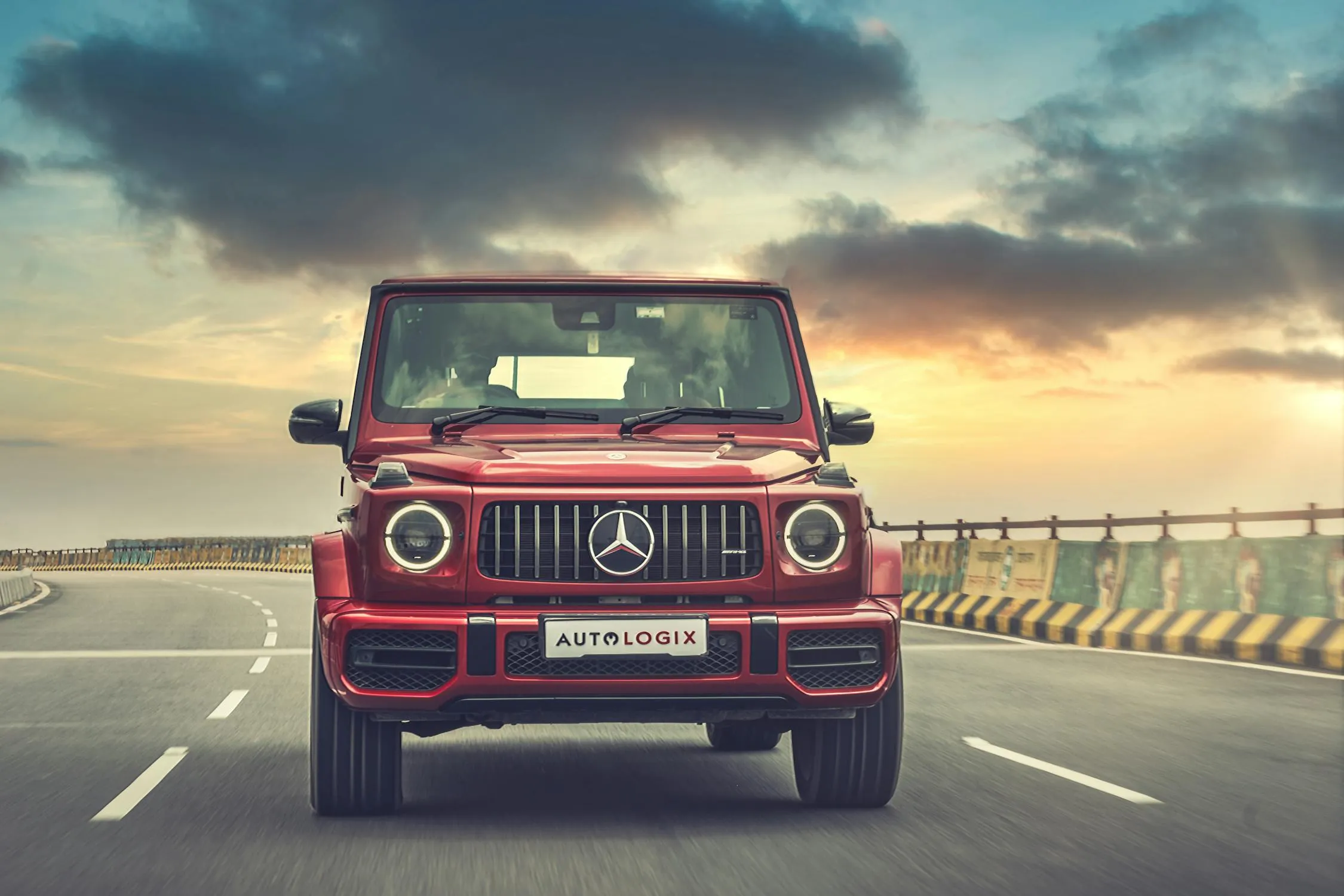 Red Mercedes Benz G Wagon on Bridge During Sunset Wallpaper