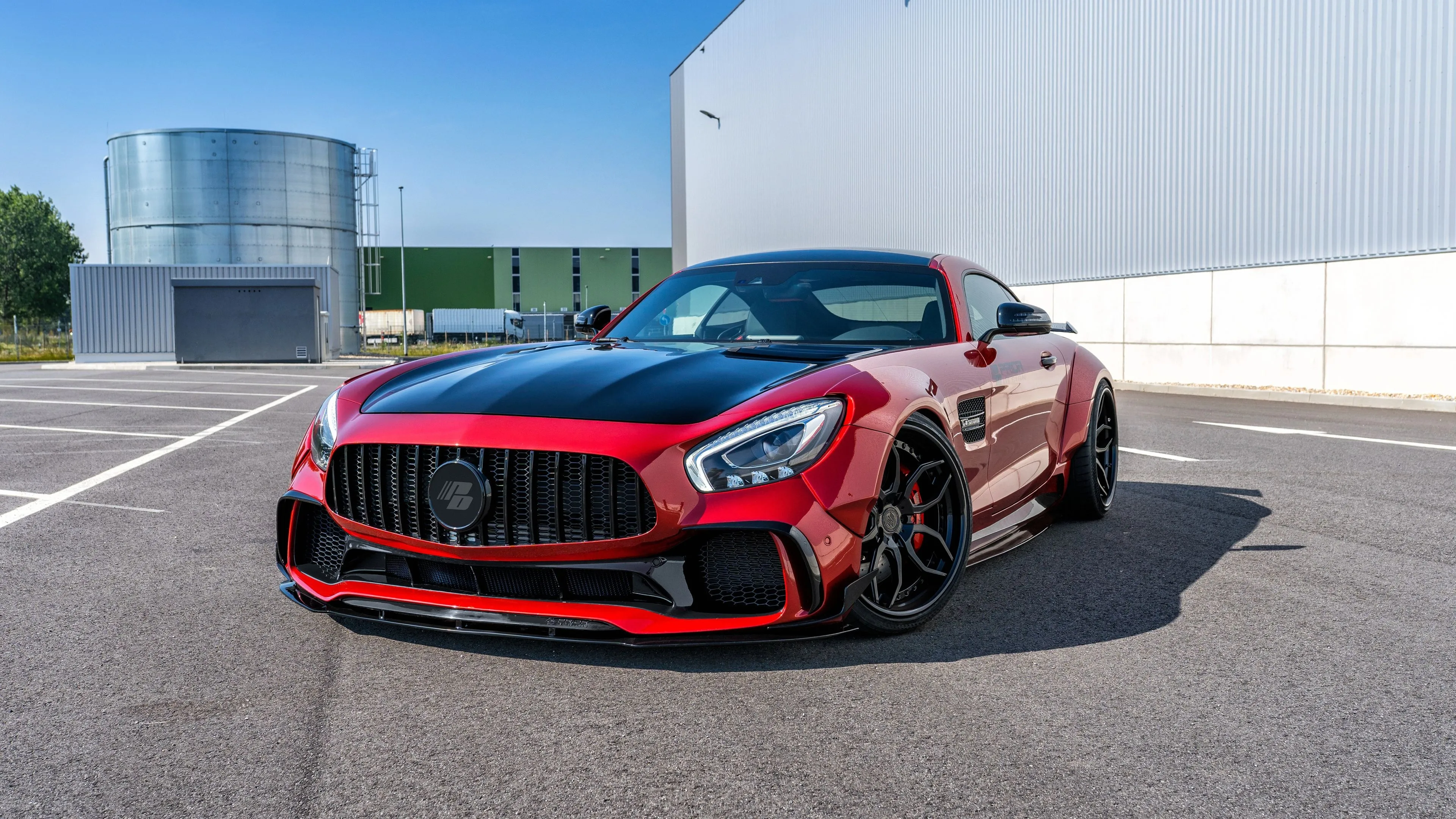 Red Mercedes Benz Sports Car in Industrial Background