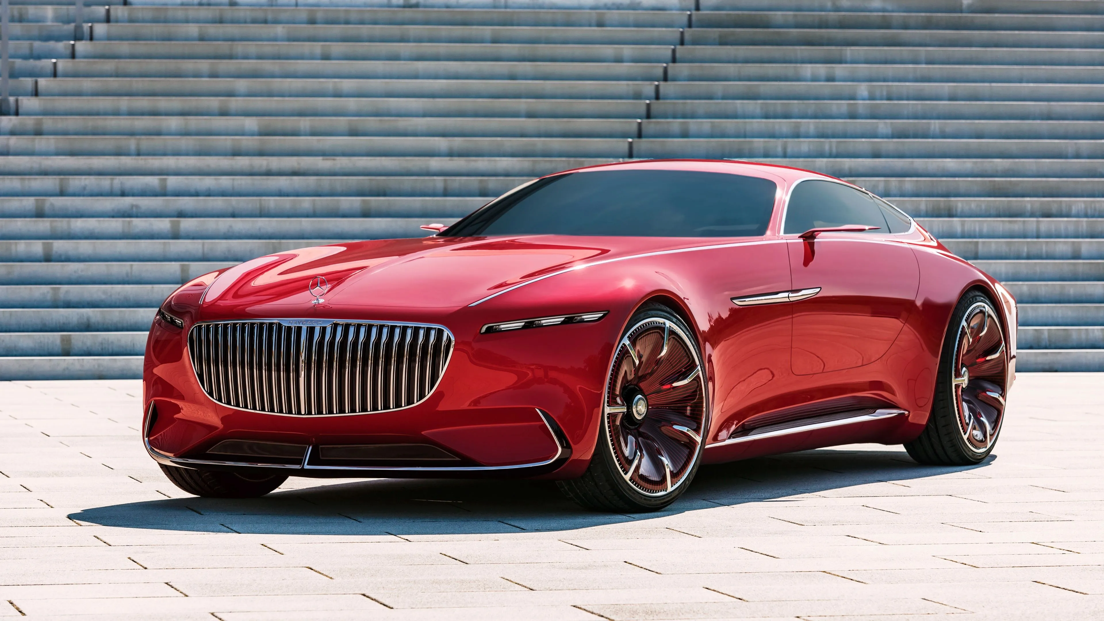Red Mercedes Benz Sports Coupe Parked on Stone Steps