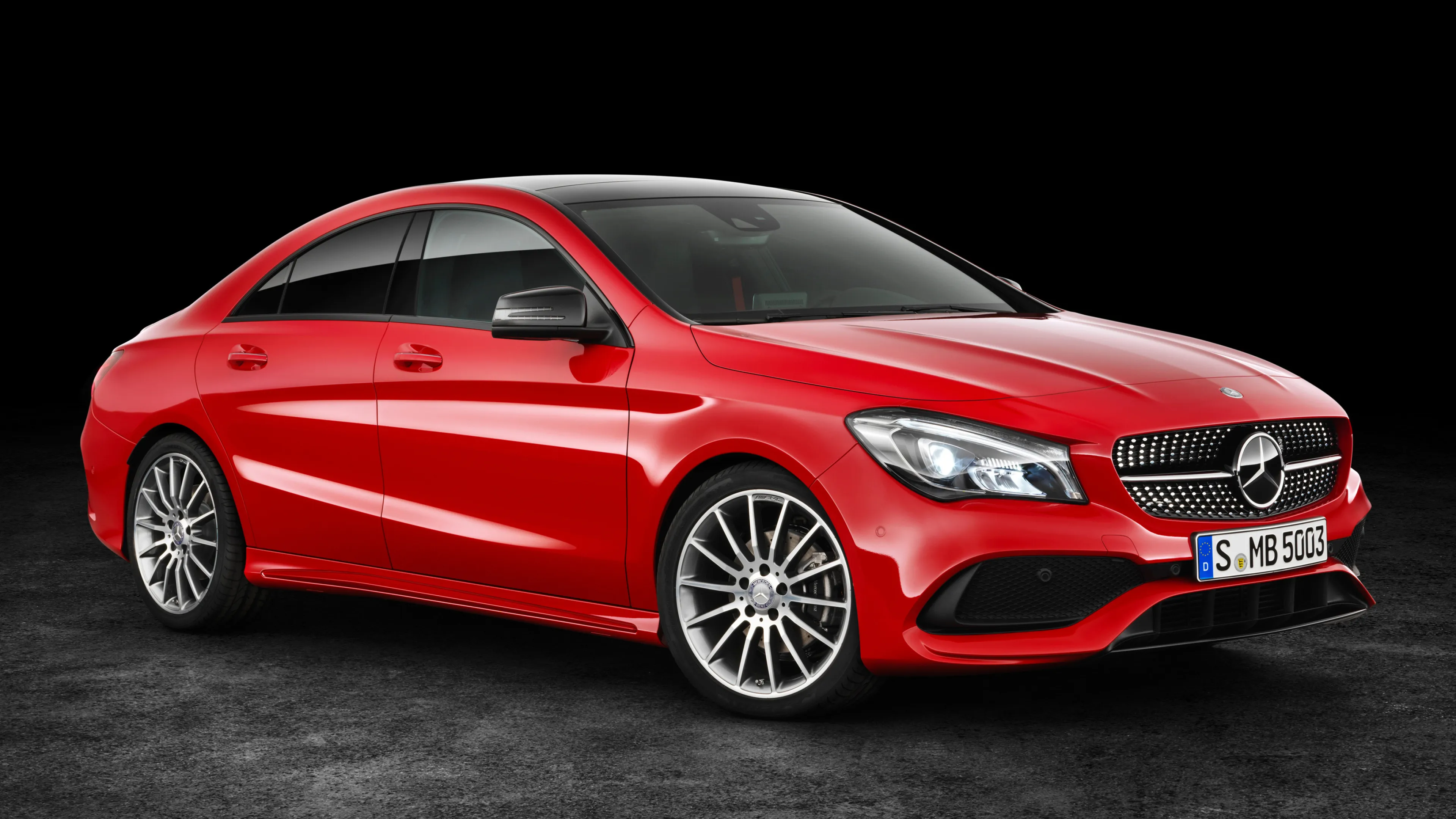 Red Mercedes Benz Stylish Coupe on Black Studio Background