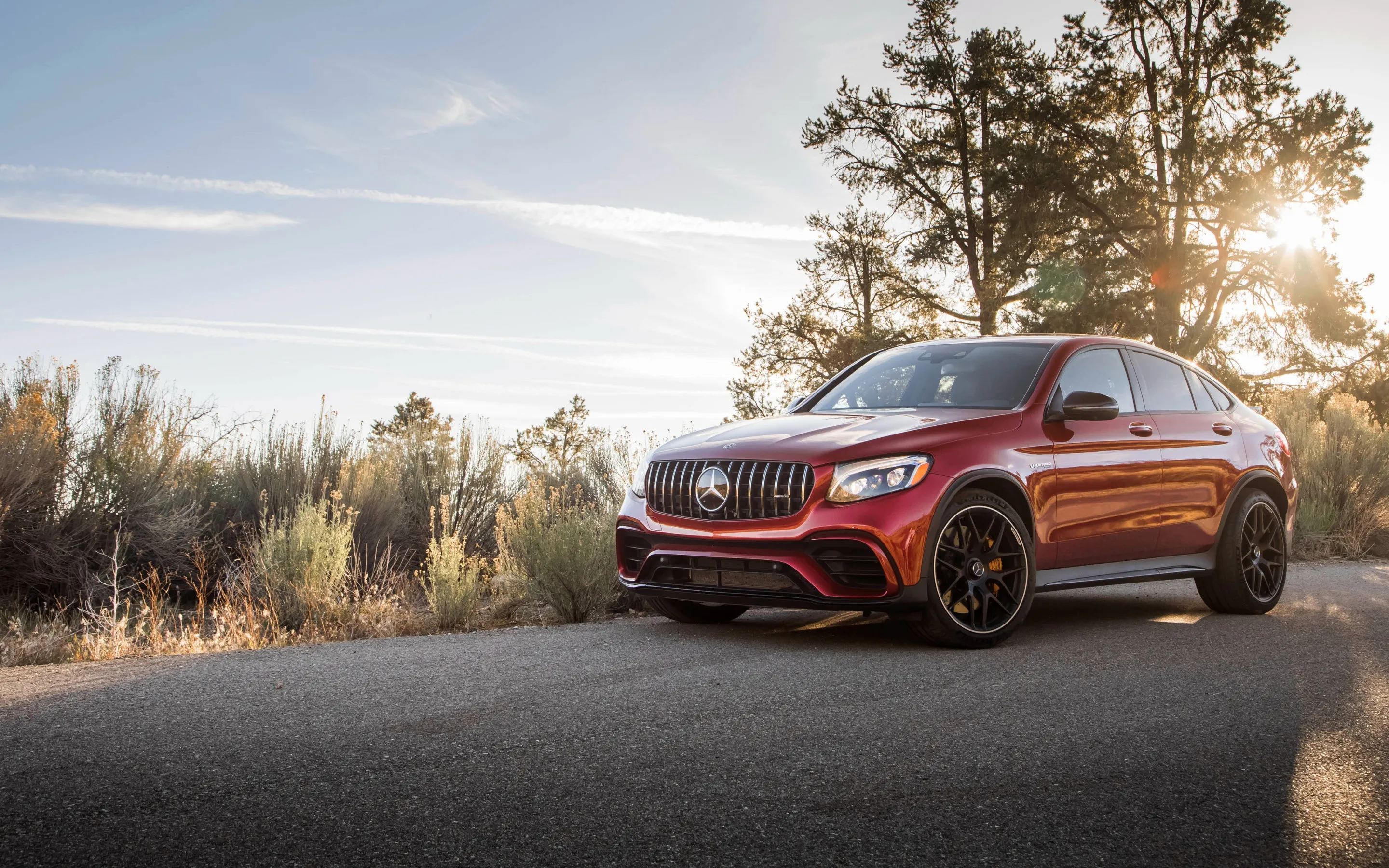 Red Mercedes Benz SUV Parked on Sunny Country Road Wallpaper