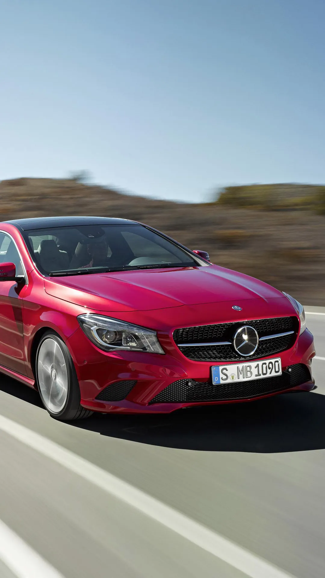 Red Mercedes on Motion Shot with Blurred Background image