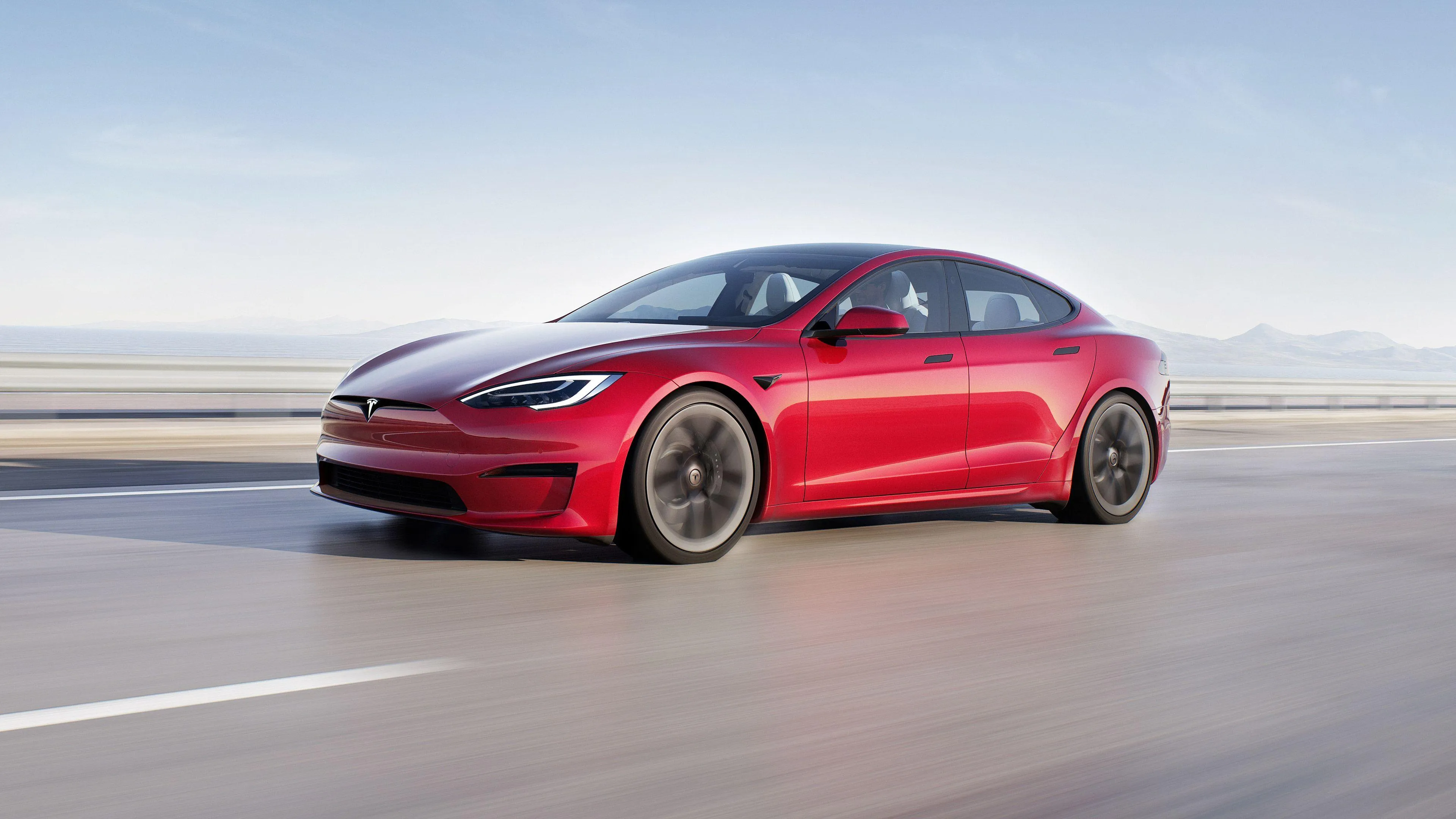 Red Tesla S is speeding on Wide Open Highway HD wallpaper