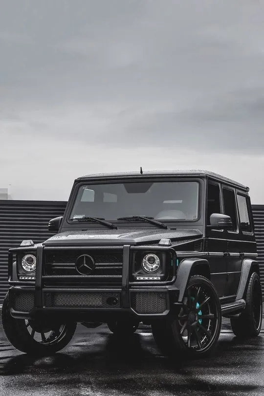 Rugged Mercedes Benz G Wagon in Rainy Outdoor Setting