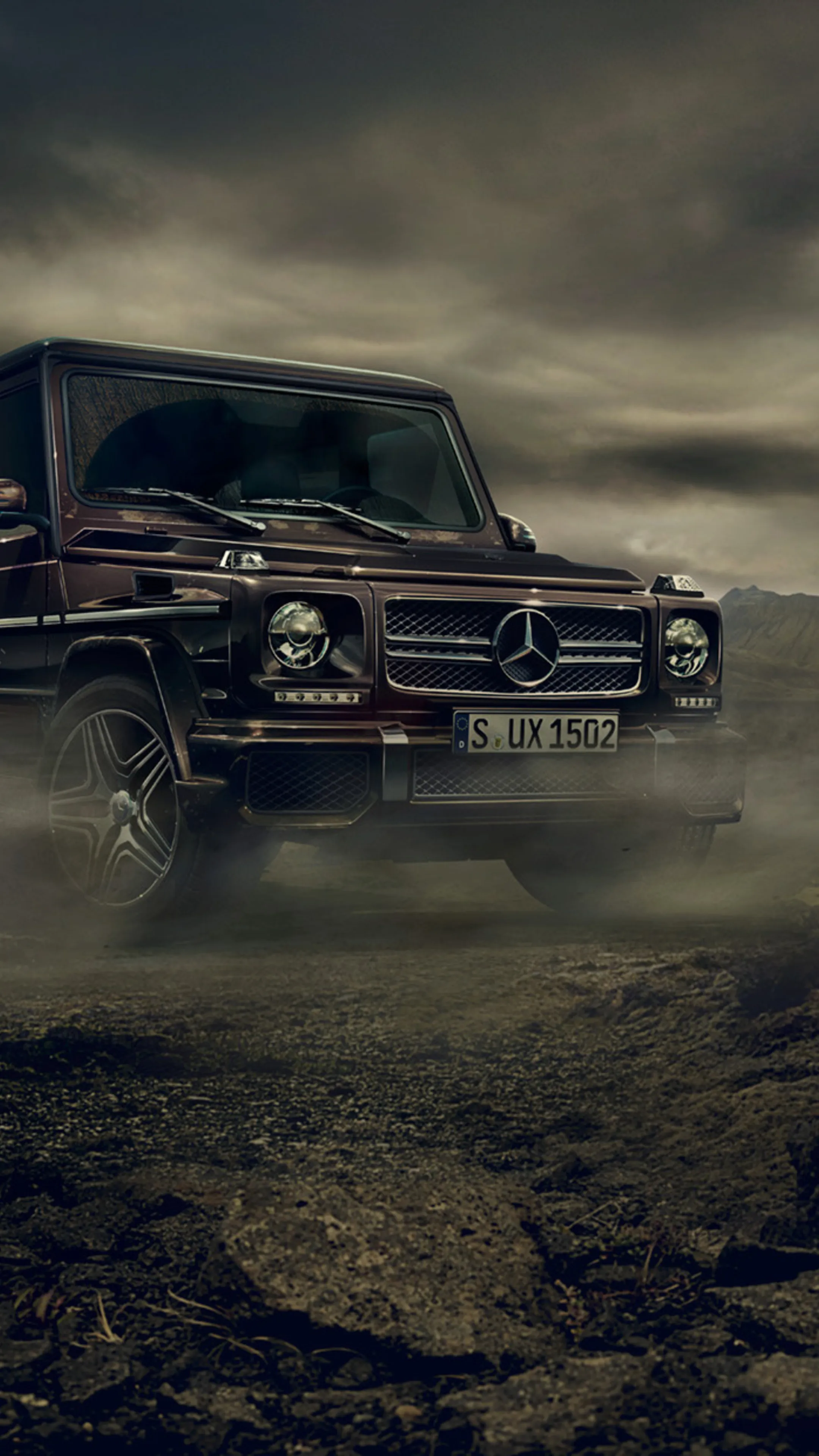 Rugged Mercedes G Wagon Driving Through Muddy Terrain