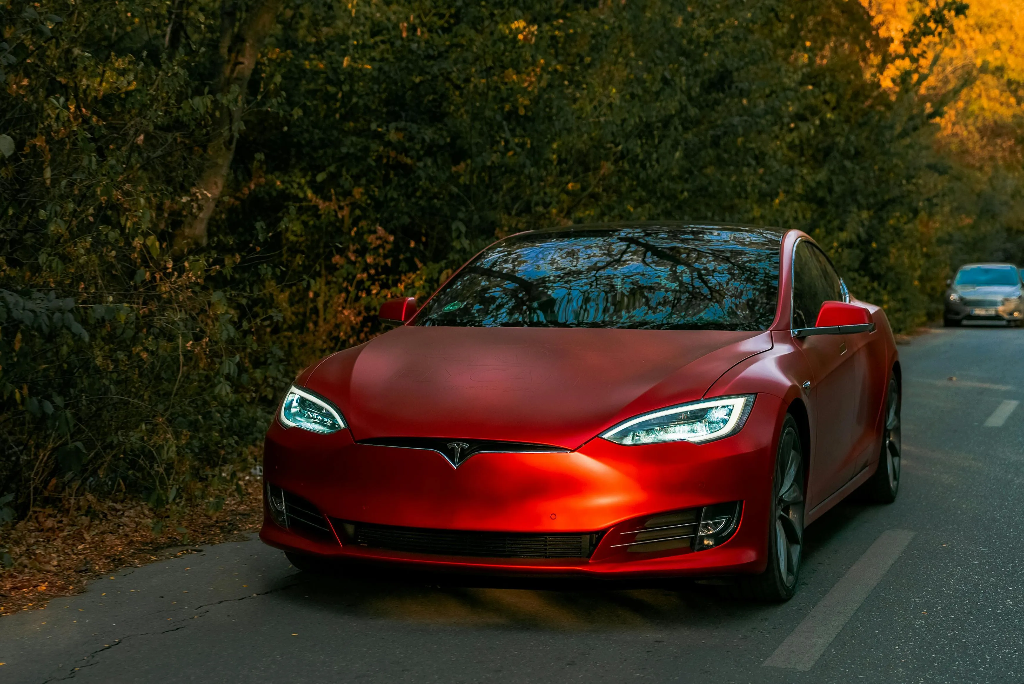 Shiny Red Tesla Model S in Peaceful Country Road HD download
