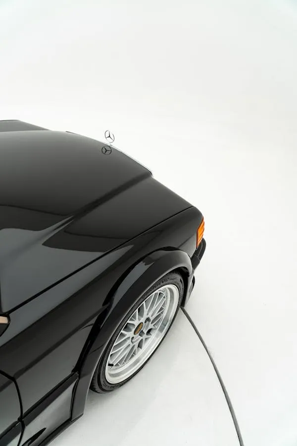 Side Angle of Classic Mercedes in Bright Studio Wallpaper