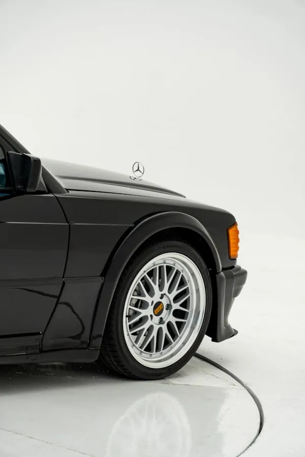 Side Closeup of Classic Black Mercedes Benz Wheel and Fender