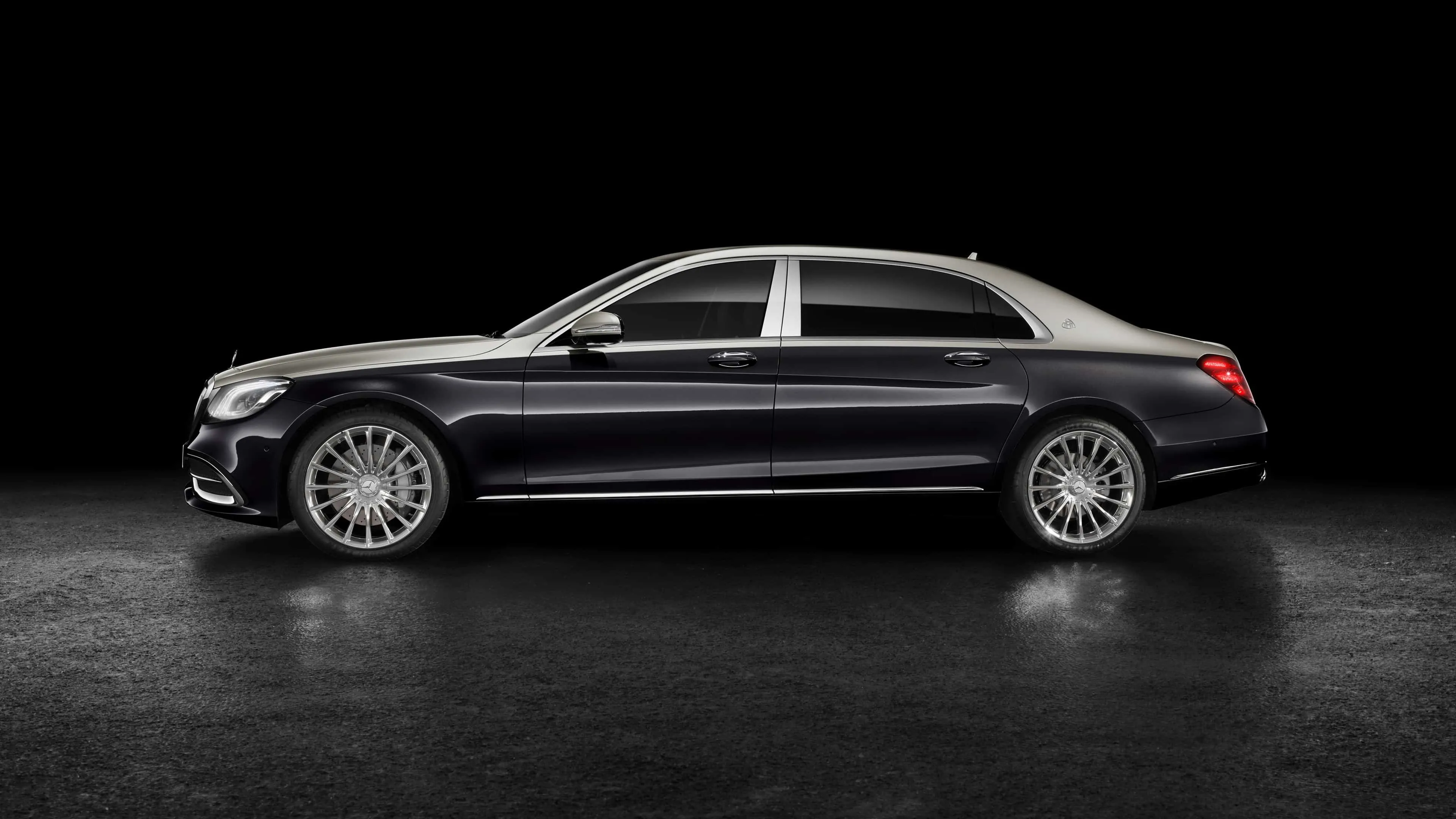 Side Profile of Black Mercedes Benz Luxury Sedan Wallpaper