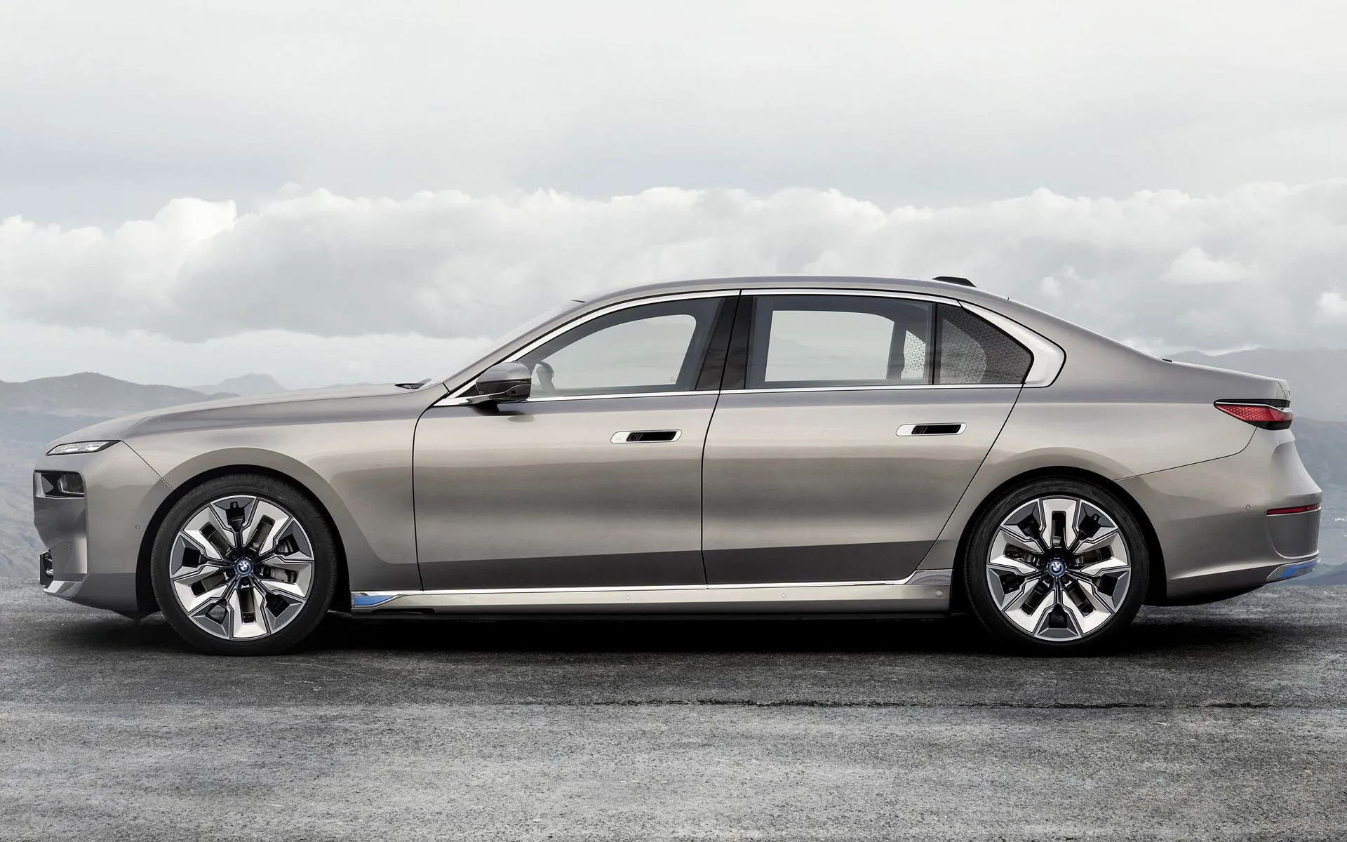 Side View of Silver Bmw Sedan Parked in Open Desert Road
