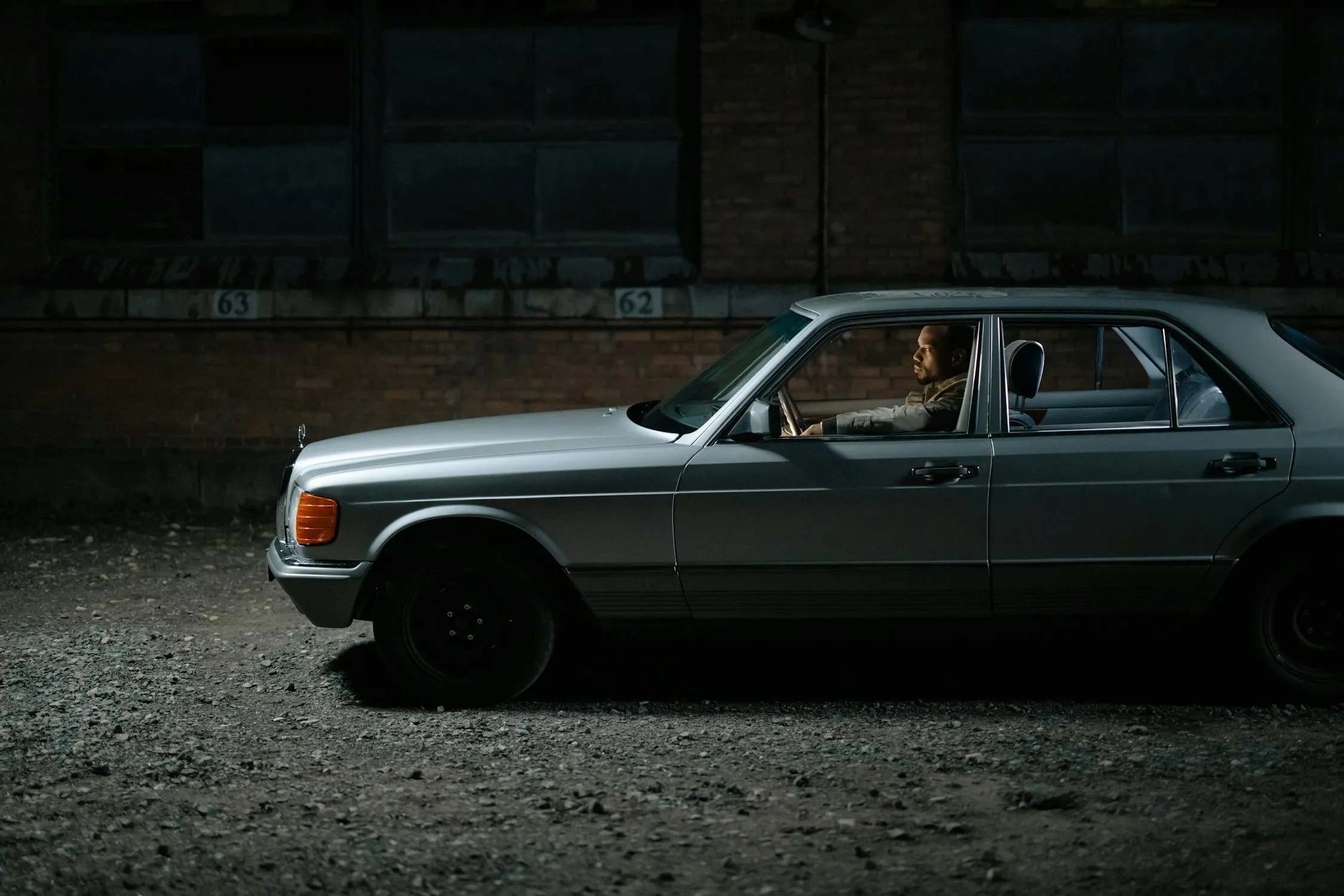 Side View of Vintage Mercedes Benz Car Parked at Night
