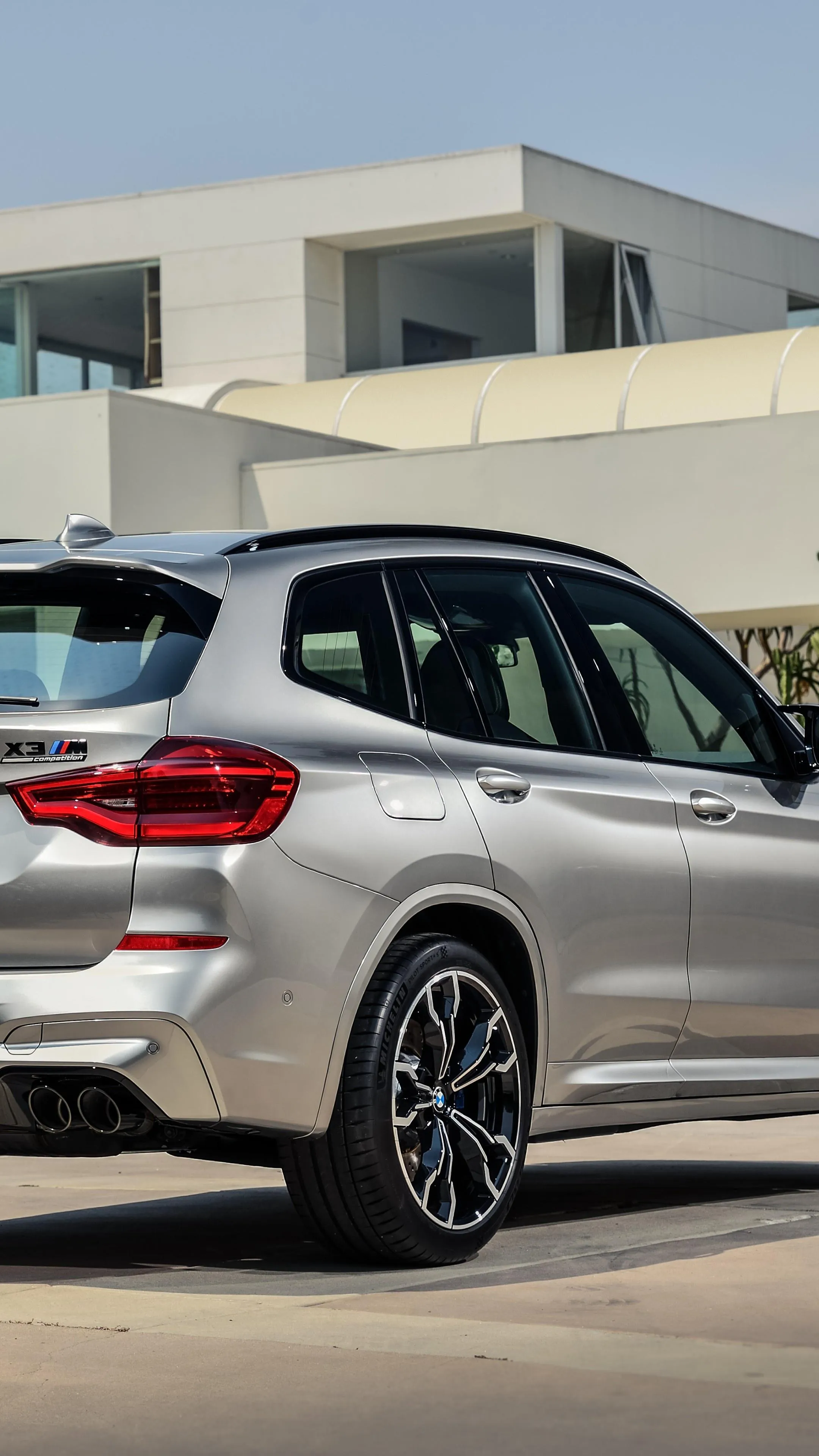 Silver Bmw Parked Outside Modern Building Hd Wallpaper